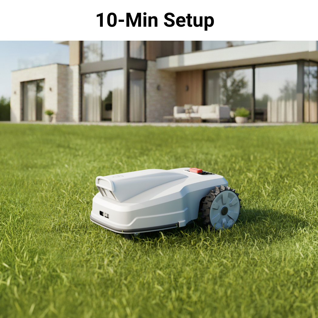Robotic lawn mower on grass with a modern house in the background